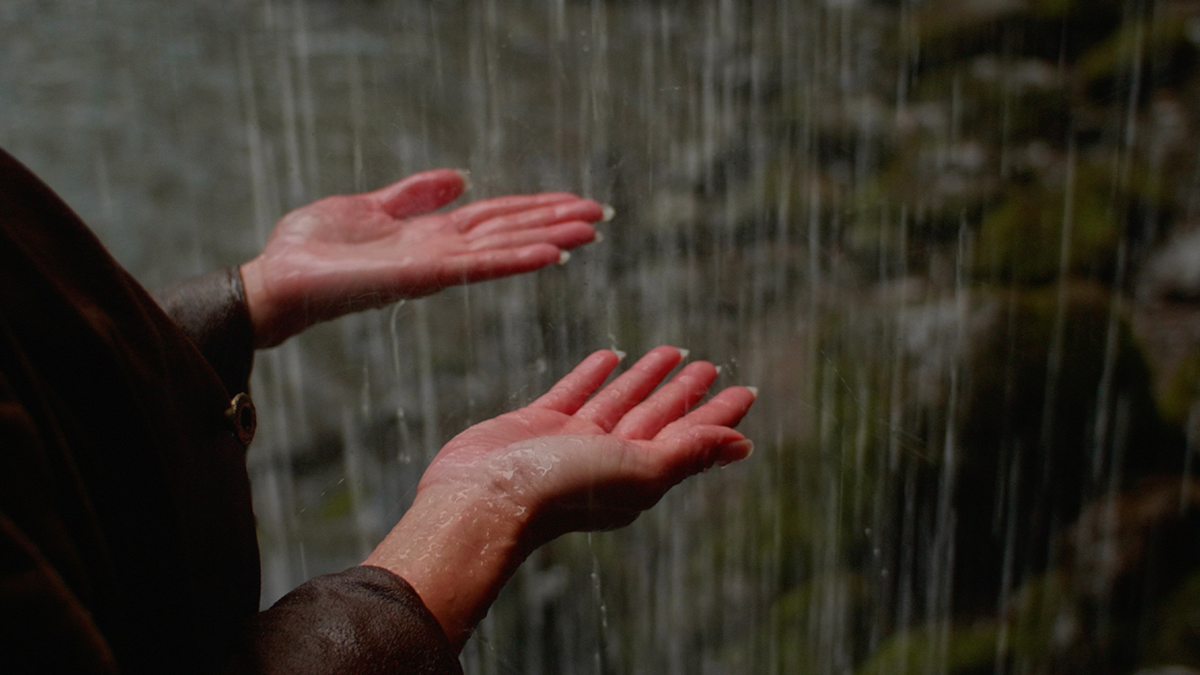 Two hands open feeling for rain
