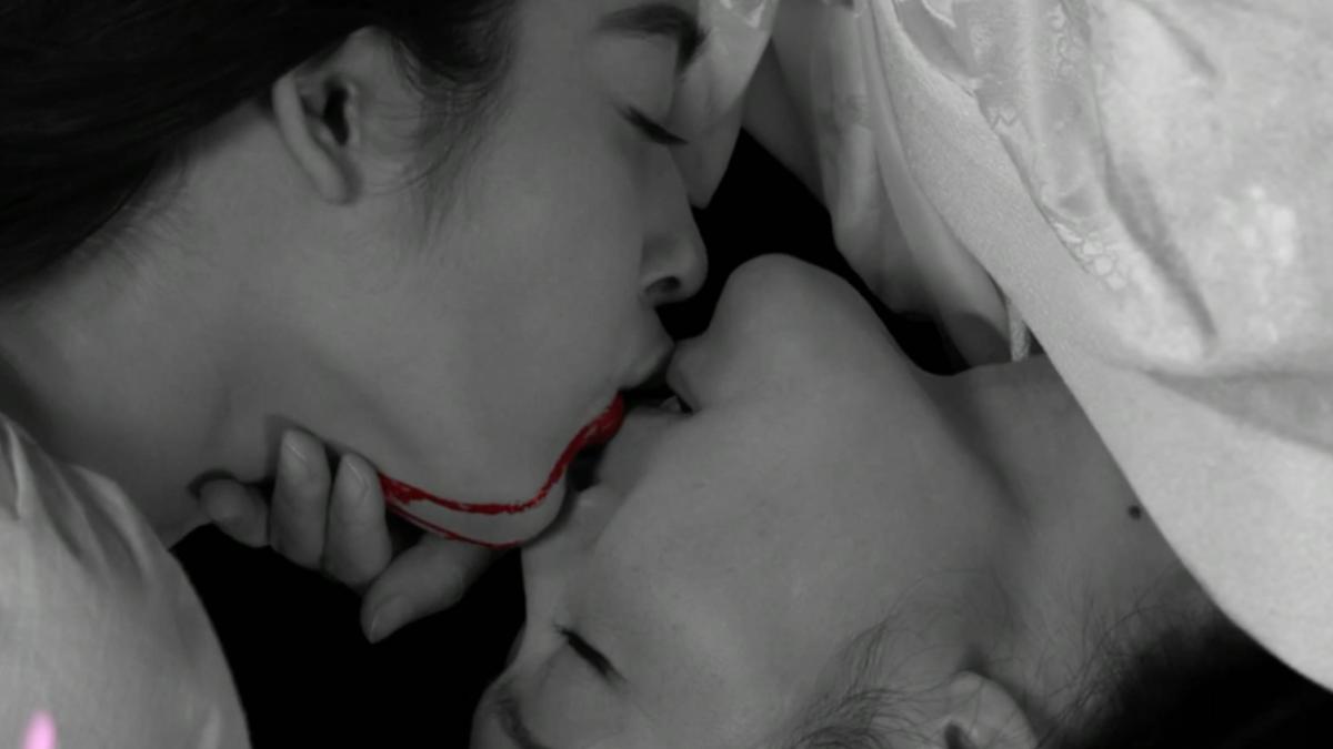 woman and man kissing