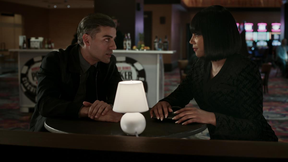 Man and woman at table in bar