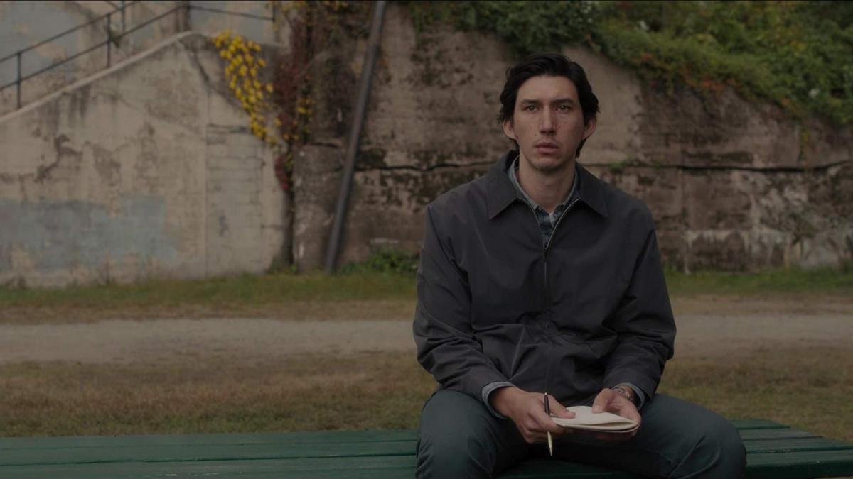 man sitting on park bench