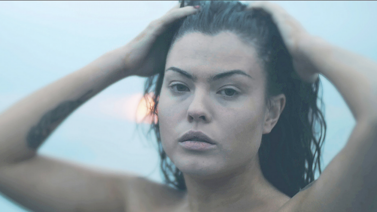 woman with hands in hair