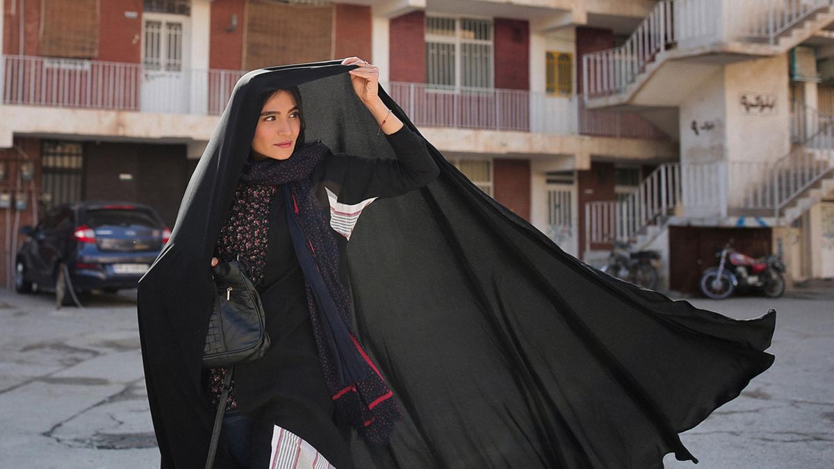 woman in black shawl