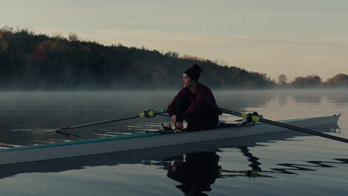 woman rowing in boat