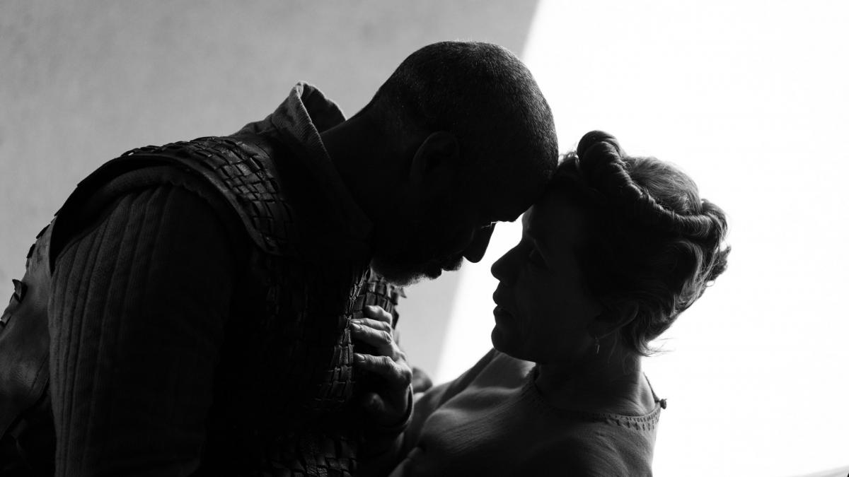 man and woman holding each other