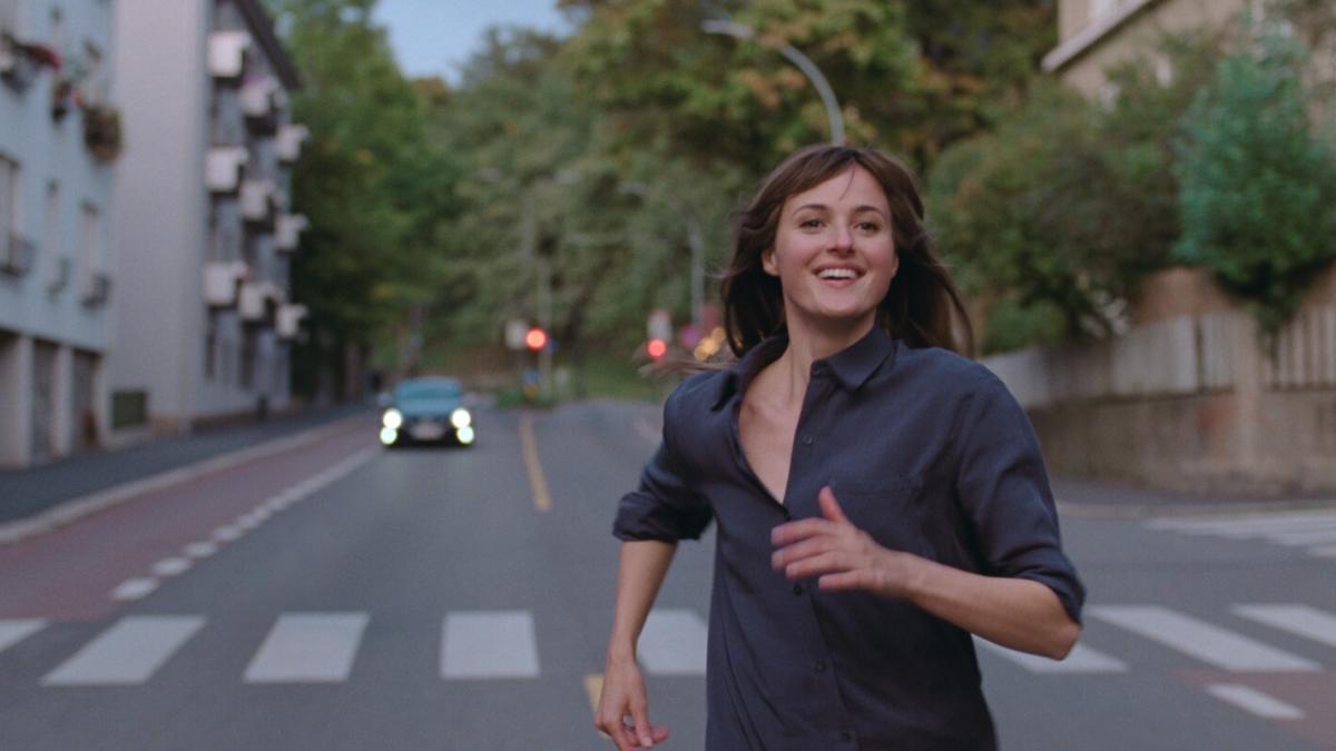 woman running down the street