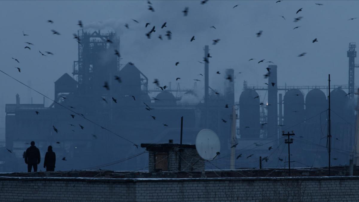 city landscape with factories and hazy smoke