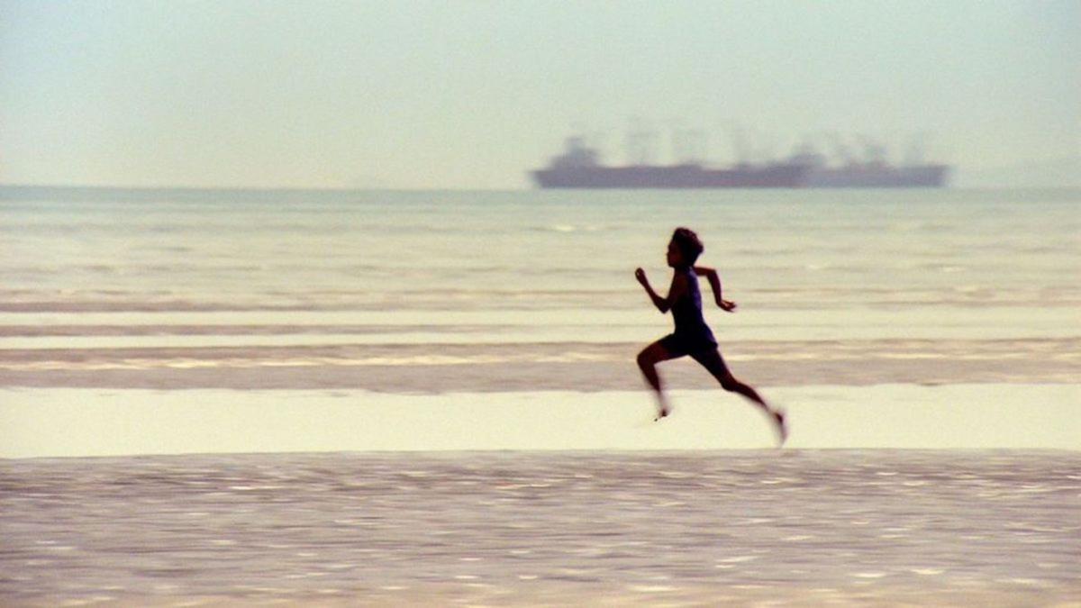 person running in barren background