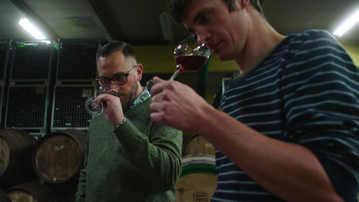 two men at wine tasting