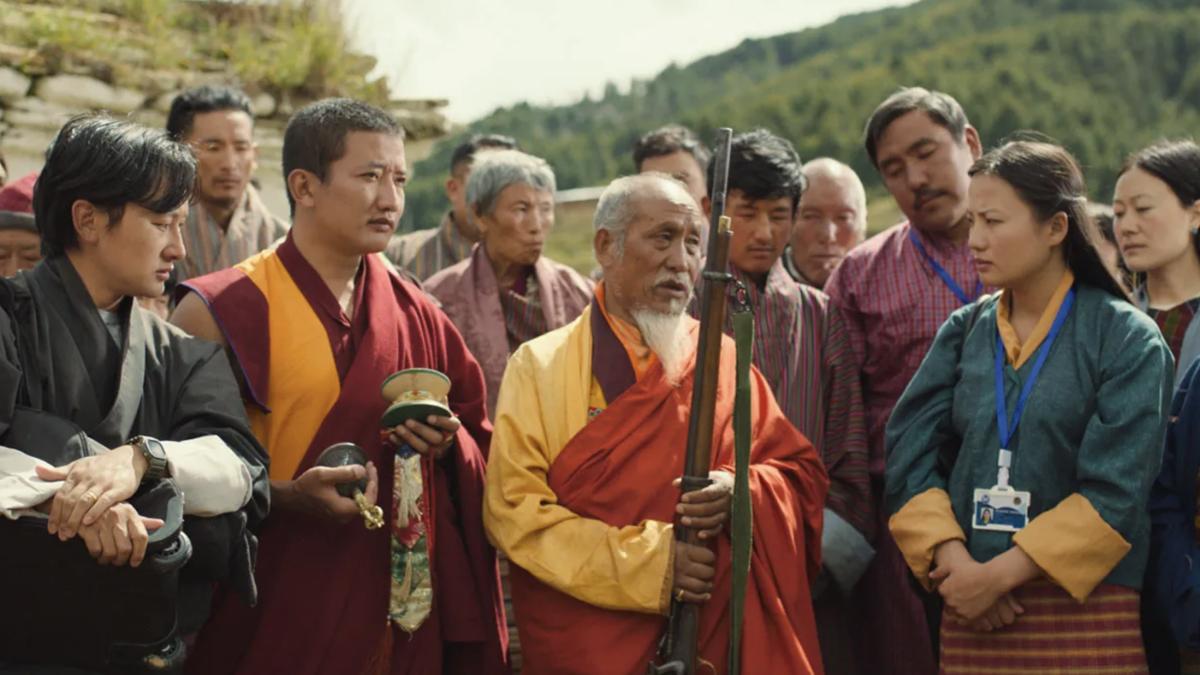 group of monks holding rifle