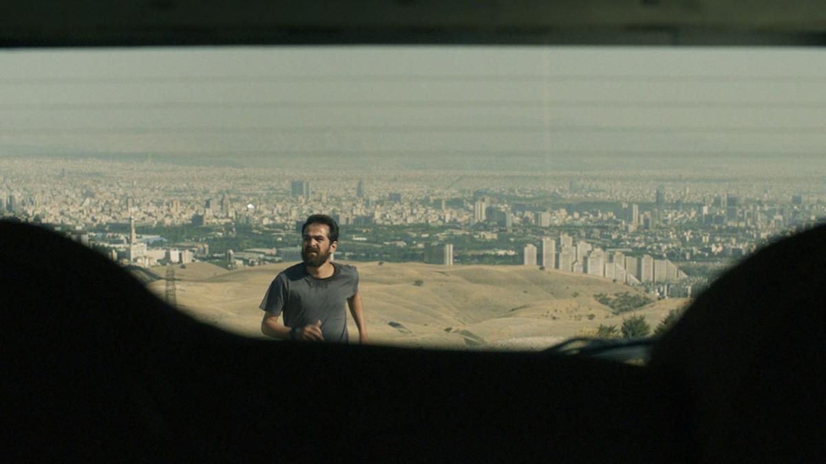 man in rearview mirror