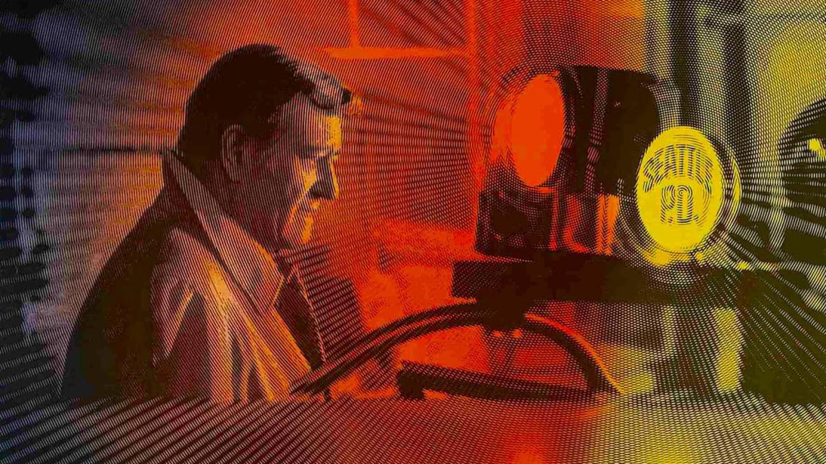 man in jacket on street with colorful foreground