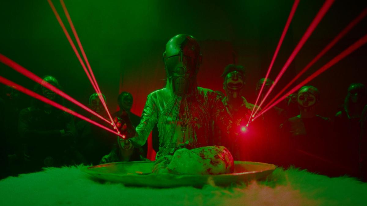 man wearing space suit with flashing lasers around him