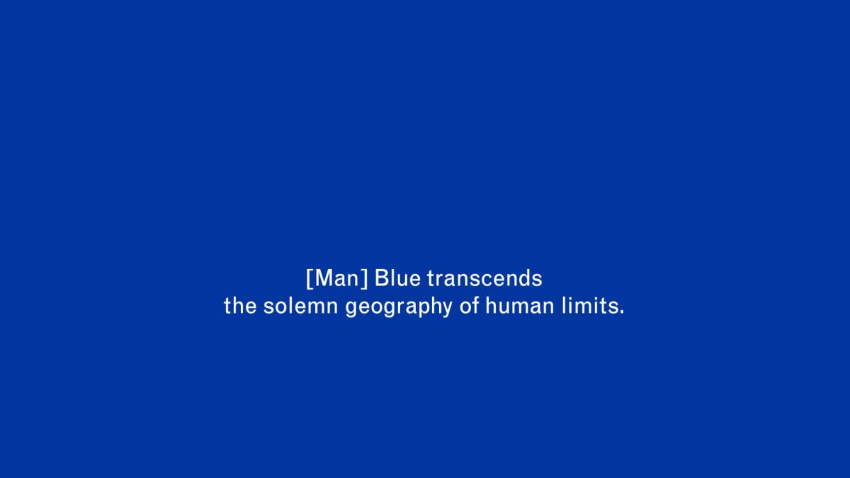 blue screen with subtitles that read "Blue transcends the solemn geography of human limits"