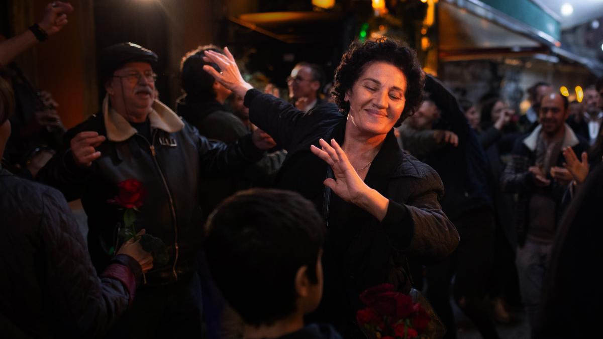 woman dancing in crowd