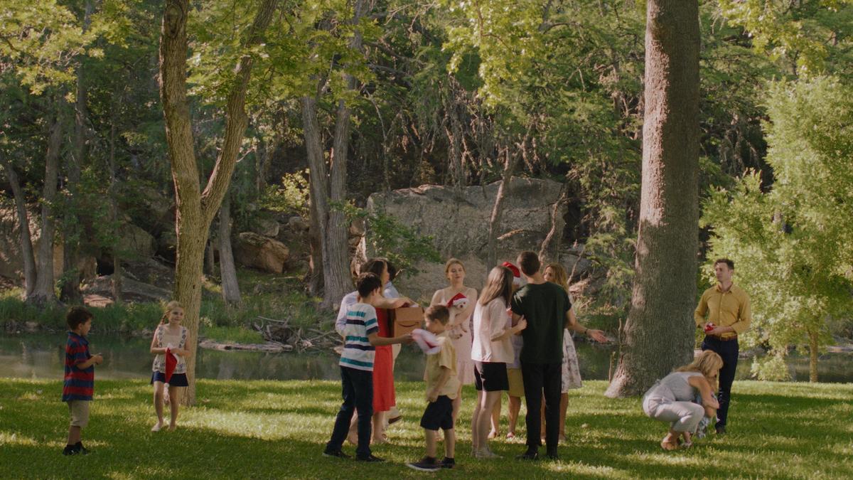 group of people playing in yard outside