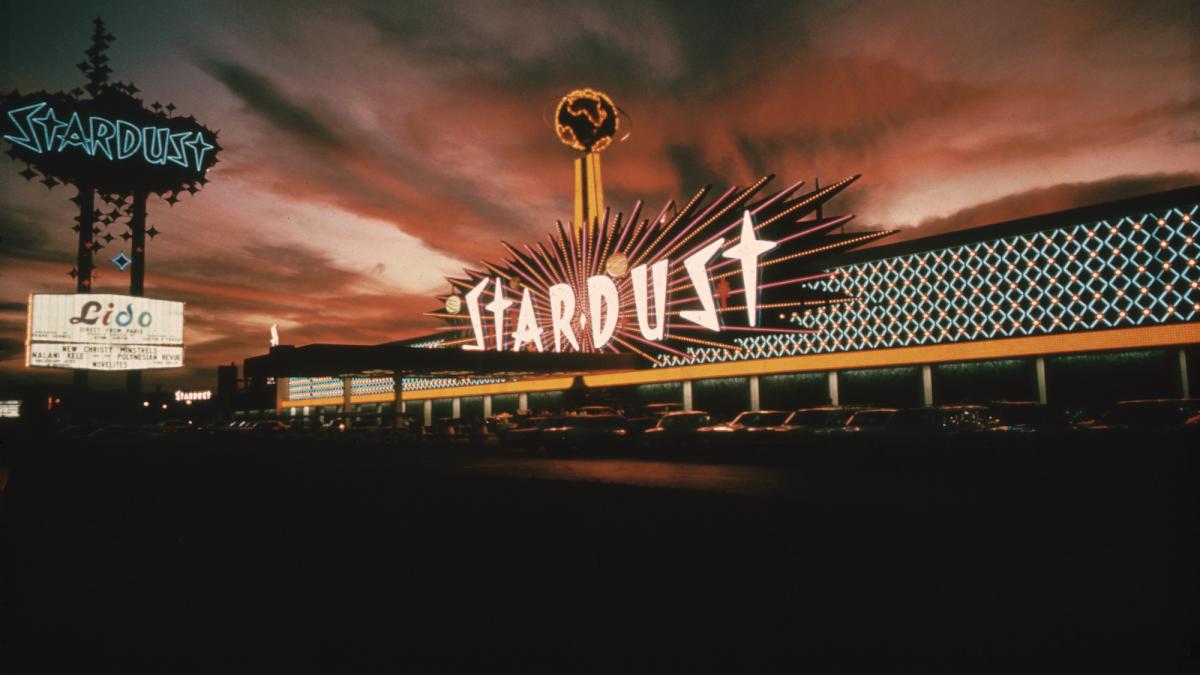 Stardust bowling alley building with sunset in background