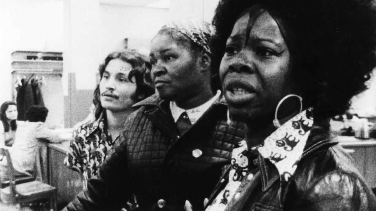 woman speaking in group of women