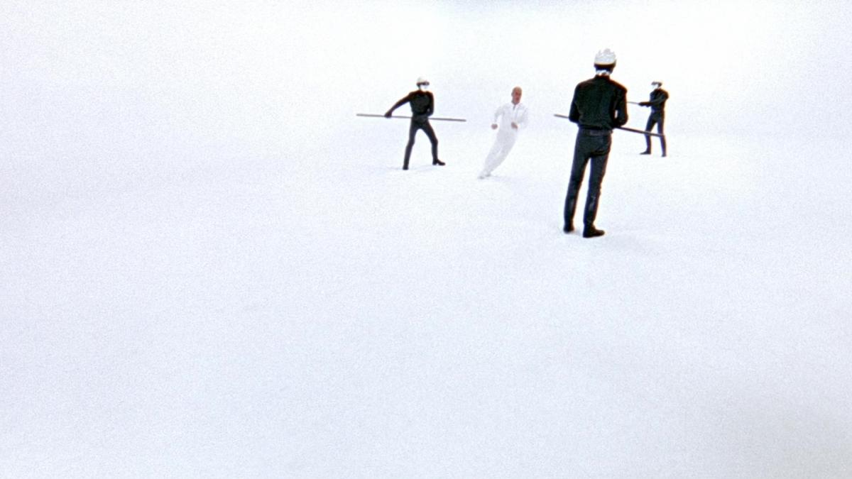 THX 1138, 1971, all white room with two men in black chasing man in all white