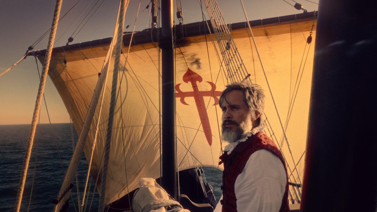 MAGELLAN, 2025, man on large ship standing in wind in front of mast