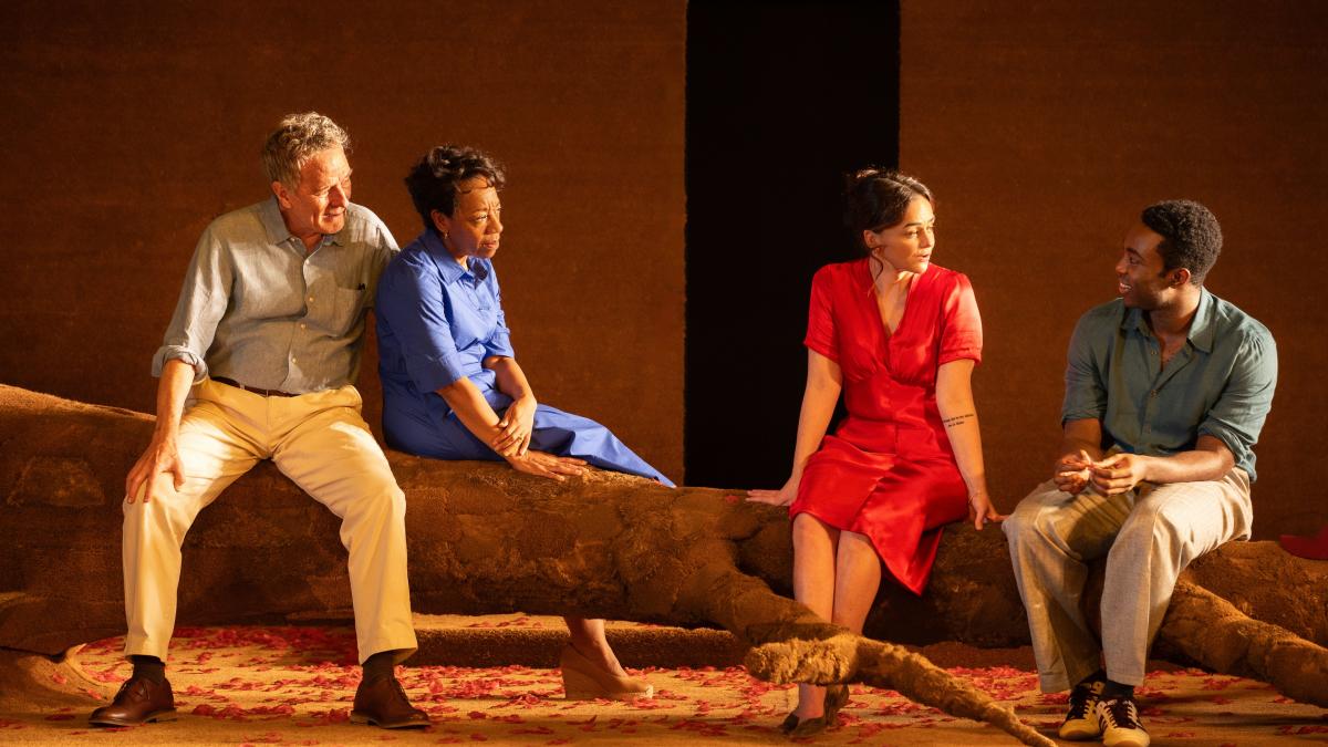 National Theatre Live: ALL MY SONS, 2026, four people seated on fallen branch on stage