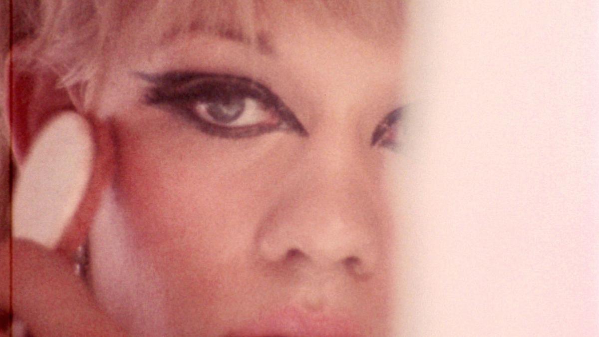 THE QUEEN, 1968, close up of blonde woman applying makeup in mirror