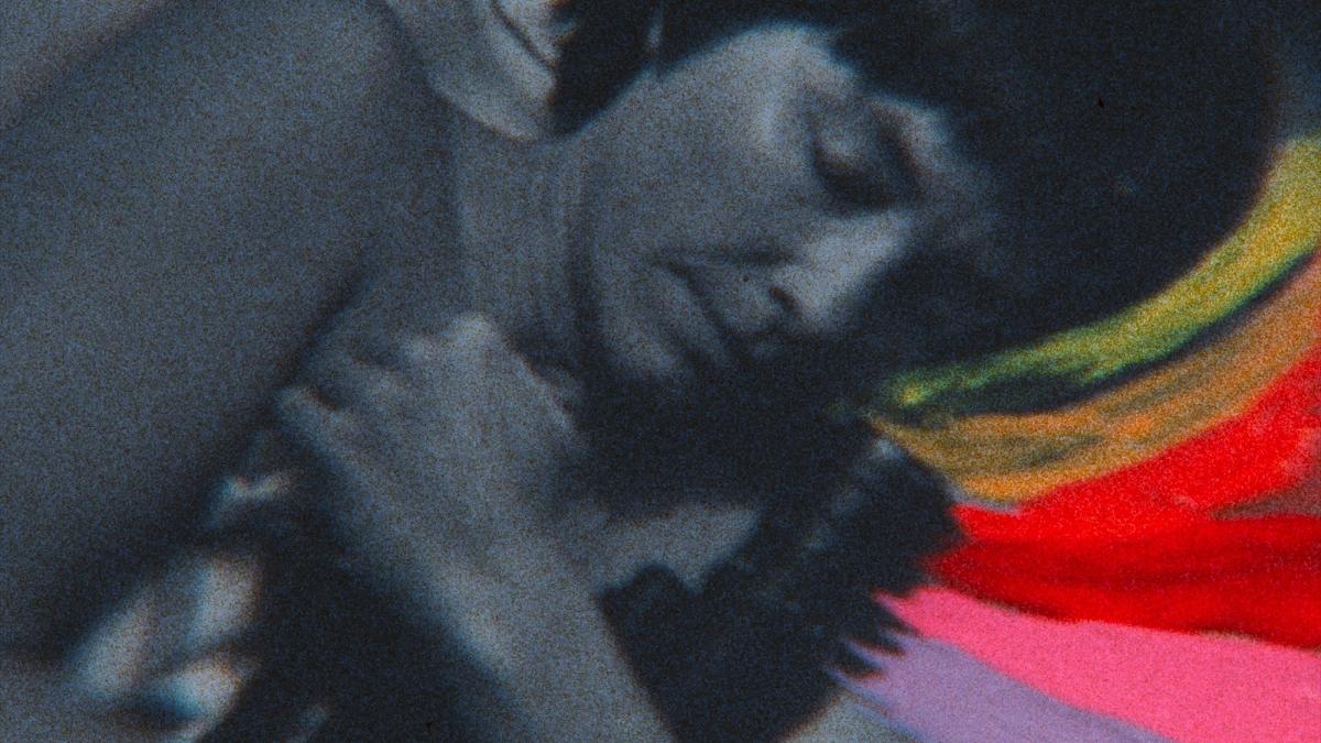 BARBARA FOREVER, 2026, black and white image of woman clutching camera with colorful lines emanating from camera