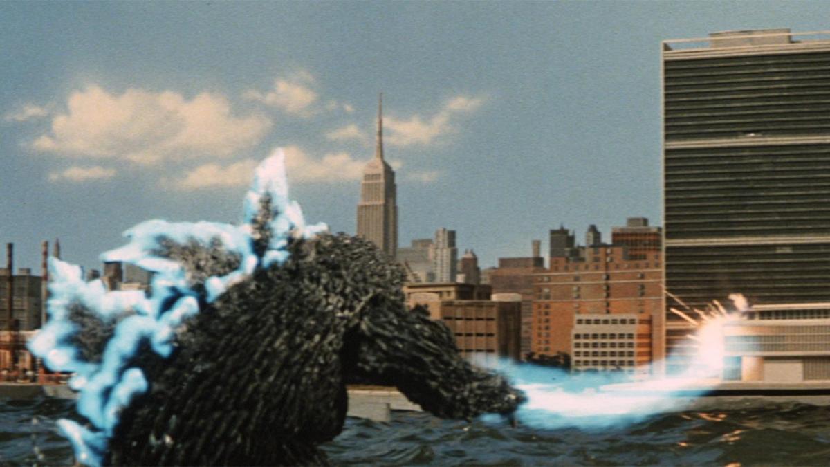 DESTROY ALL MONSTERS, 1968, Godzilla-like monster rising out of water at shore of city