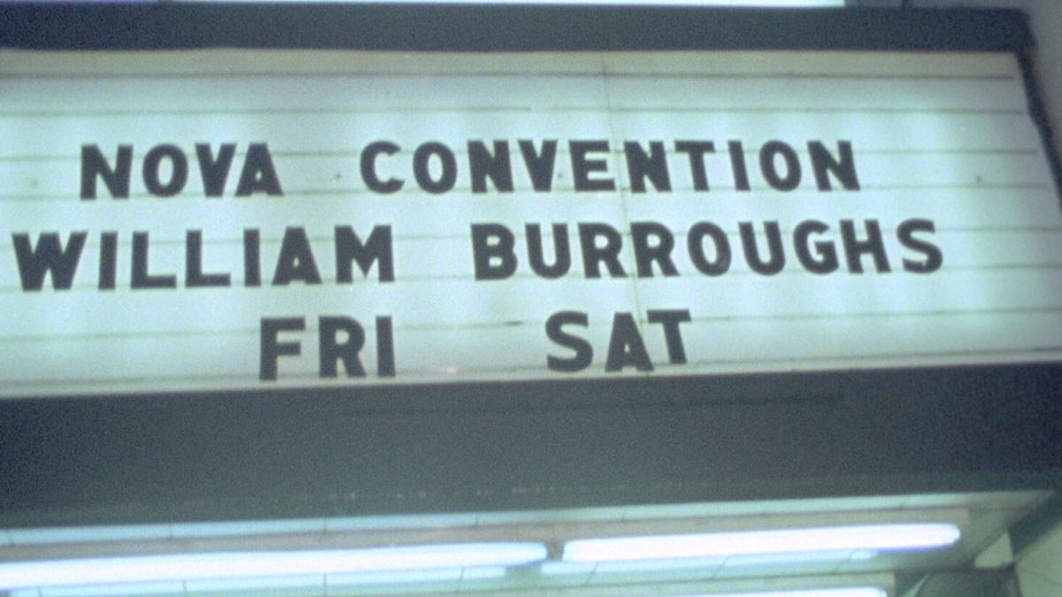 NOVA '78, 2025, marquee from below that says "NOVA CONVENTION WILLIAM BURROUGHTS FRI SAT"