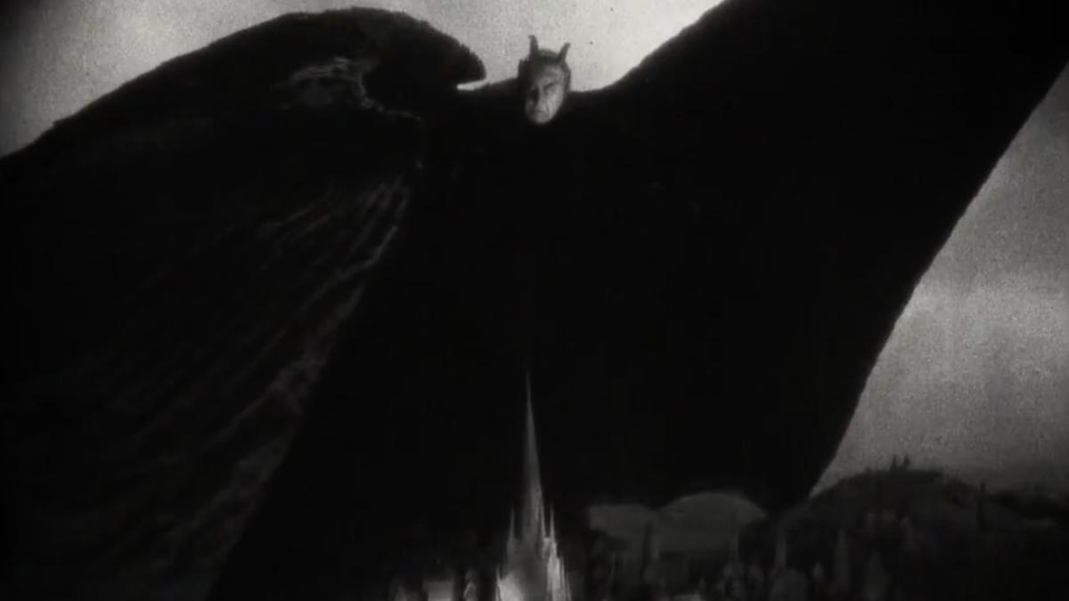 FAUST, 1926, demon-creature with large black wings looming over landscape