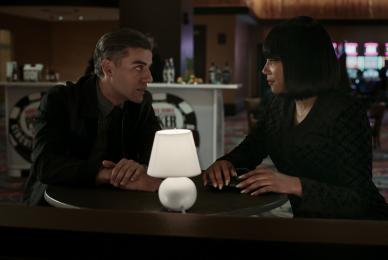 Man and woman at table in bar