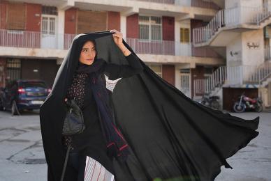 woman in black shawl