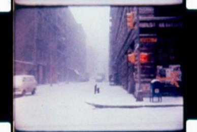 film strip of snowy street corner scene