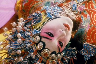 woman laying down in geisha garb